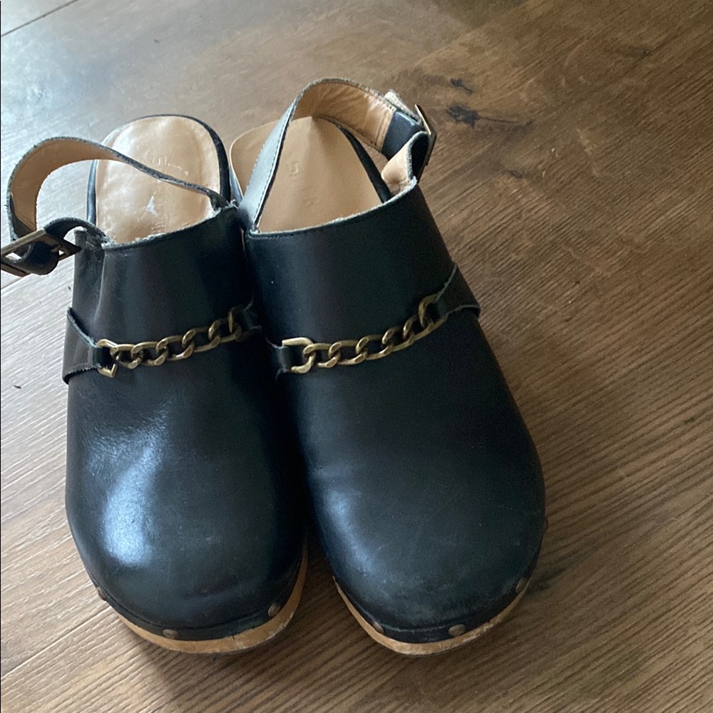 Black Leather Clogs with Chain Detail. SILENT brand .